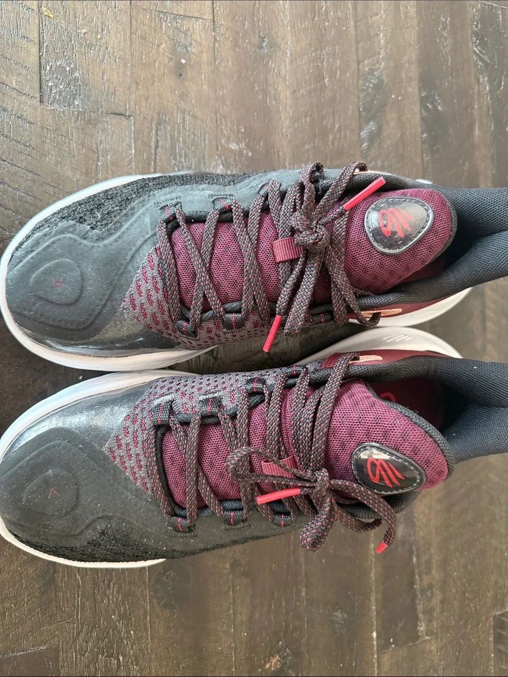 Under Armour Men's Athletic Shoes Curry 11 in Black and Burgundy